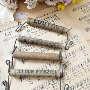 Poignées de sac publicitaires anciennes de grands magasins