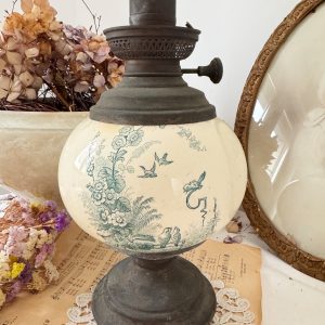 Lampe à pétrole en faience oiseaux